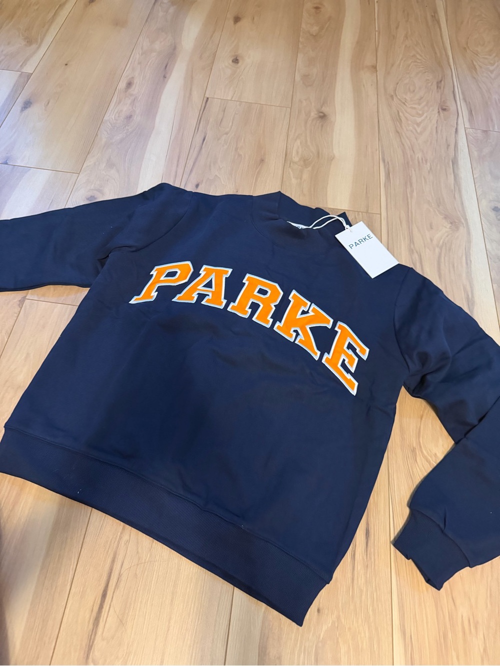 Parke Navy Crewneck Sweatshirt with Orange Lettering